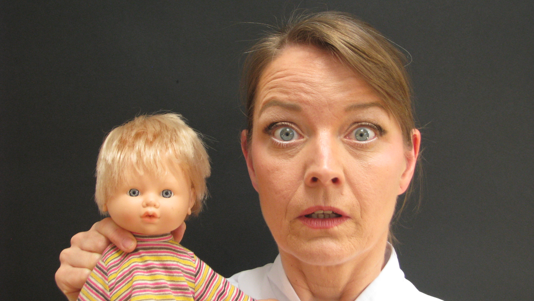 Publicity Image Sandman; Narrator and doll representing Nathaniel stare at the camera