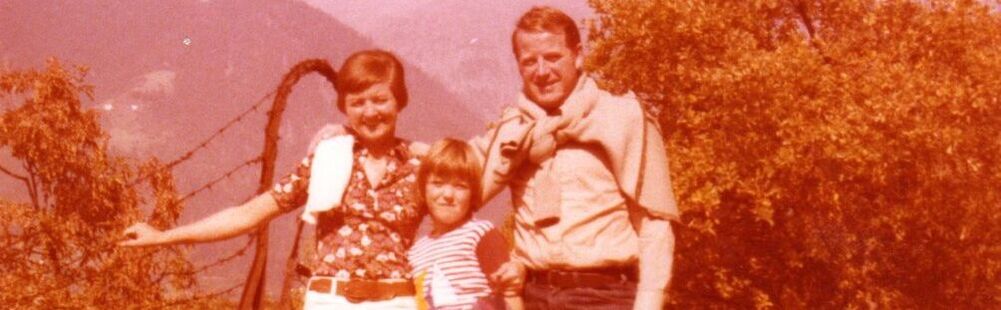 Photo of Adie's Mum and Dad with Adie aged 10ee